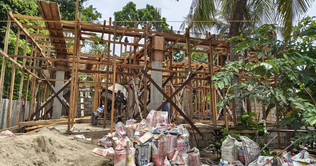 Formworks and cement bags on a Philippine residential construction site