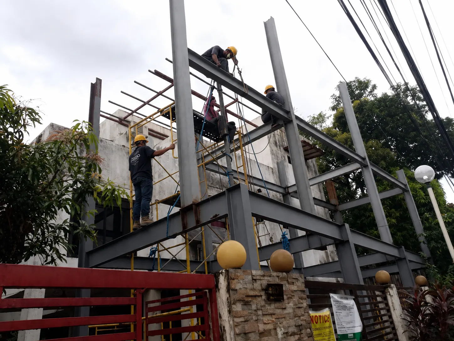 Steel frame structure being erected on-site, AEDO construction
