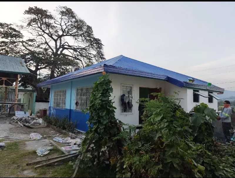 Alangilanan Daycare Center with new blue roofing during improvement works — Manjuyod, Negros Oriental